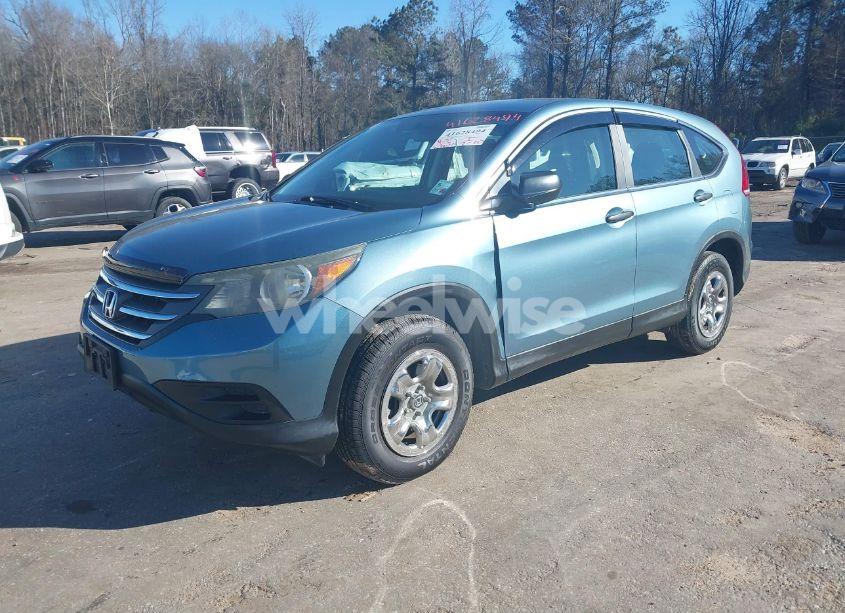 Photo 2 of 2013 Honda Cr-v LX (VIN 2HKRM3H37DH520989)