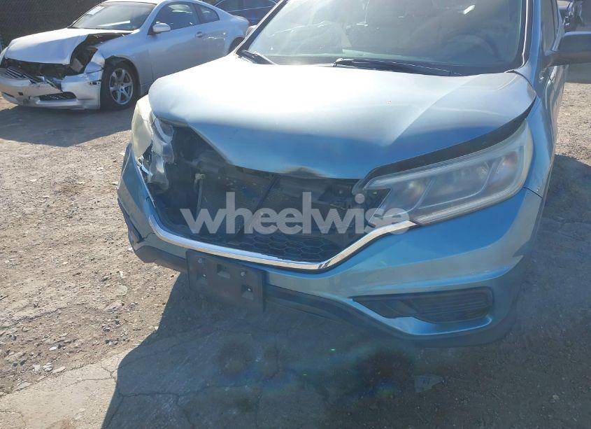 Photo 6 of 2015 Honda Cr-v LX (VIN 2HKRM3H38FH500818)