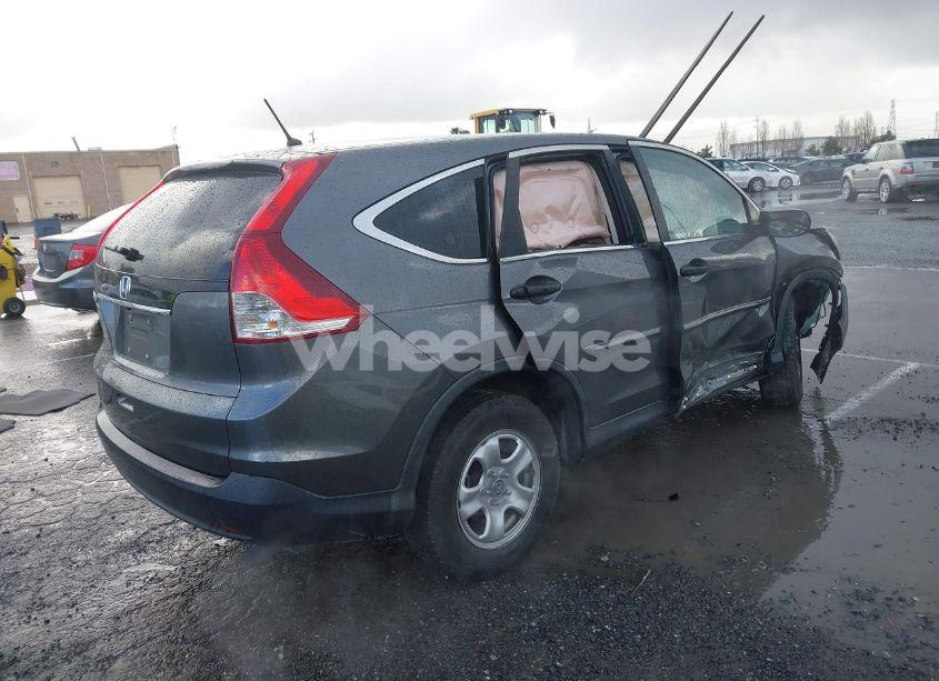 Photo 4 of 2014 Honda Cr-v LX (VIN 2HKRM3H3XEH523208)