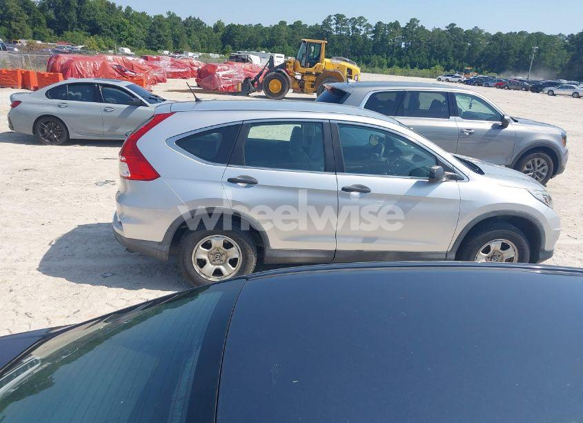 Photo 13 of 2015 Honda Cr-v LX (VIN 2HKRM3H3YFH500573)