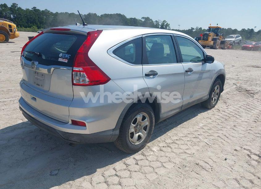 Photo 4 of 2015 Honda Cr-v LX (VIN 2HKRM3H3YFH500573)