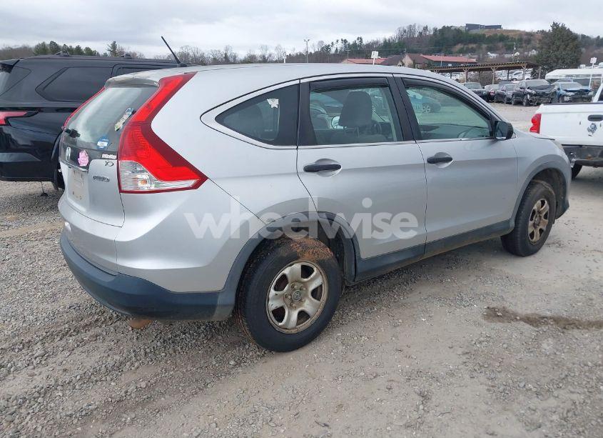 Photo 4 of 2013 Honda Cr-v LX (VIN 2HKRM4H30DH619532)