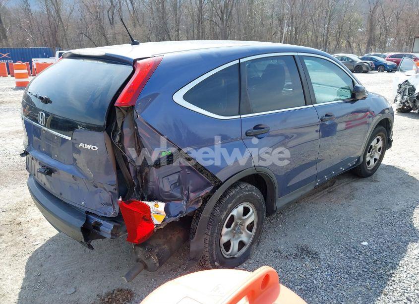 Photo 4 of 2014 Honda Cr-v LX (VIN 2HKRM4H30EH649177)