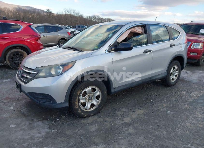 Photo 2 of 2014 Honda Cr-v LX (VIN 2HKRM4H30EH661006)