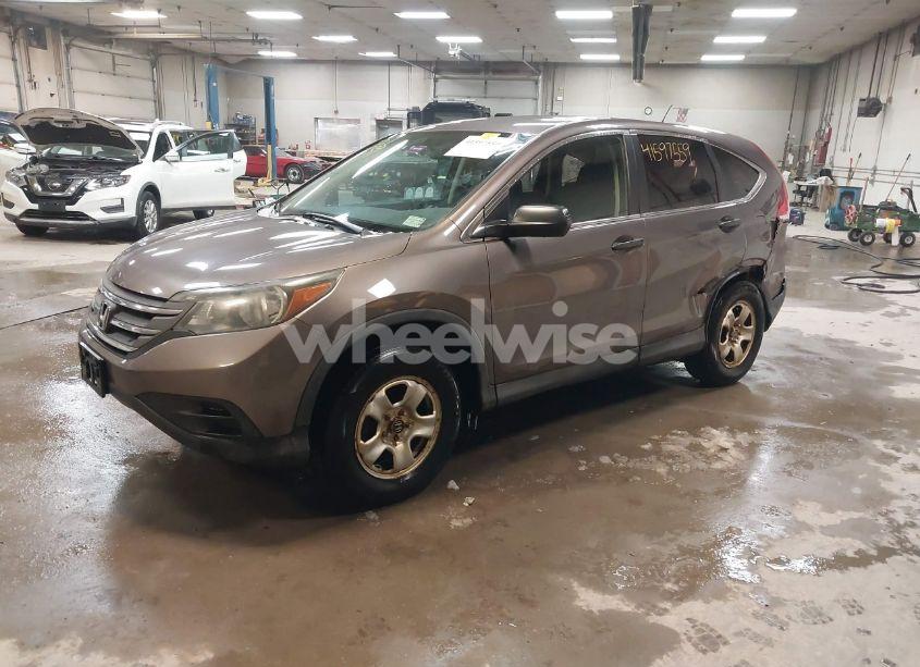 Photo 2 of 2014 Honda Cr-v LX (VIN 2HKRM4H30EH664231)