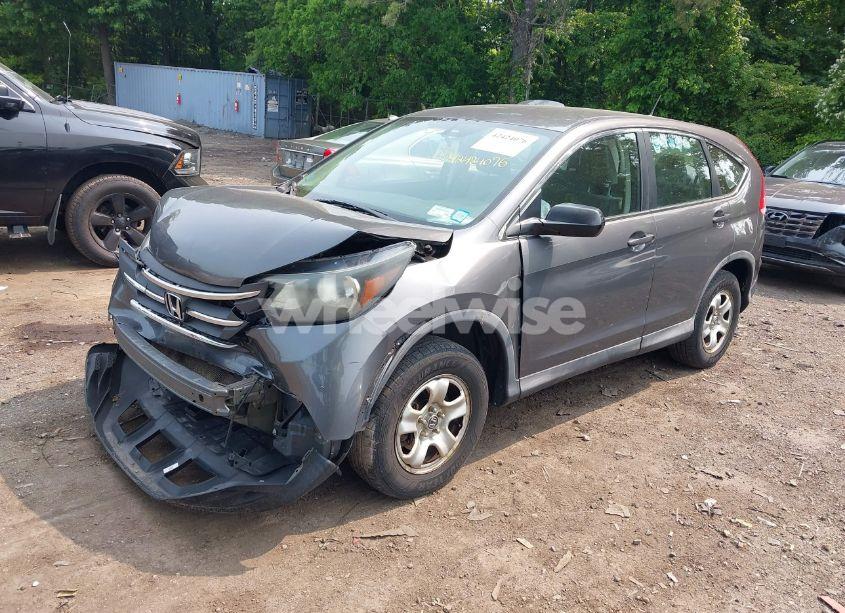 Photo 2 of 2014 Honda Cr-v LX (VIN 2HKRM4H30EH670143)