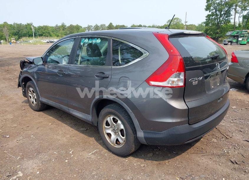 Photo 3 of 2014 Honda Cr-v LX (VIN 2HKRM4H30EH670143)