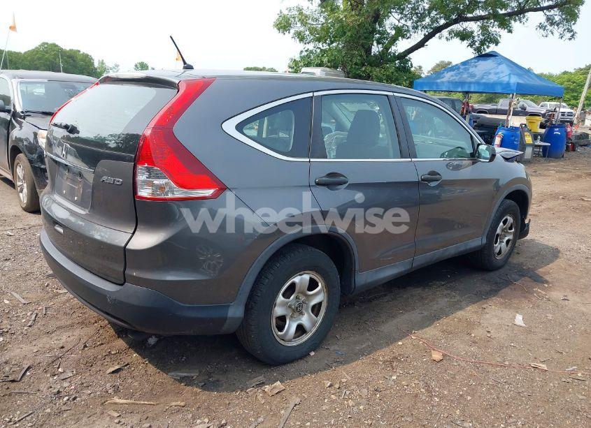 Photo 4 of 2014 Honda Cr-v LX (VIN 2HKRM4H30EH670143)