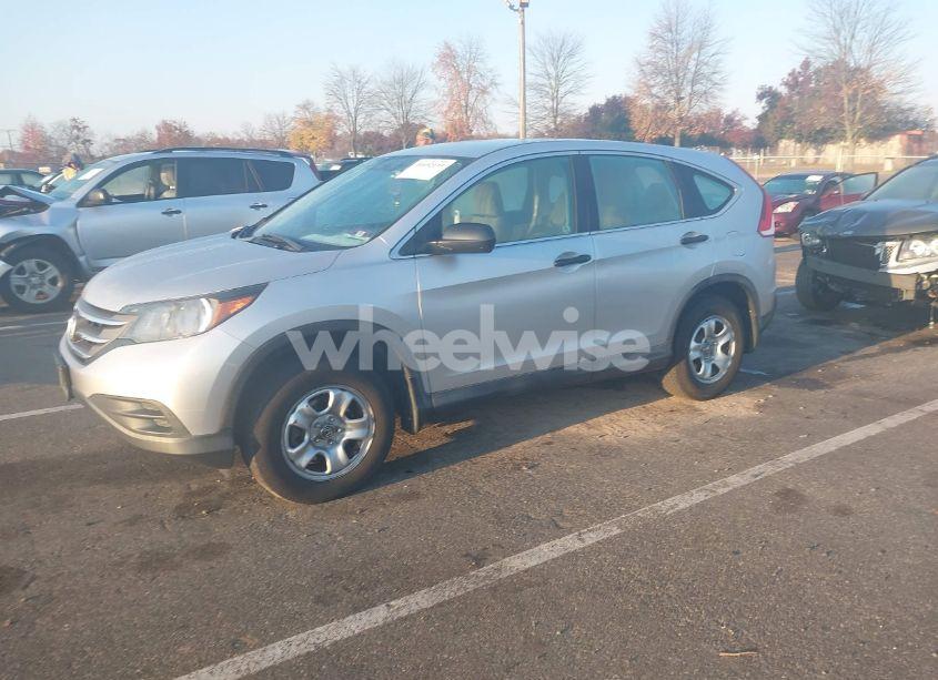 Photo 2 of 2014 Honda Cr-v LX (VIN 2HKRM4H30EH688321)