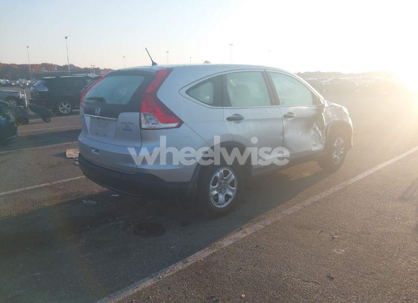 Photo 4 of 2014 Honda Cr-v LX (VIN 2HKRM4H30EH688321)
