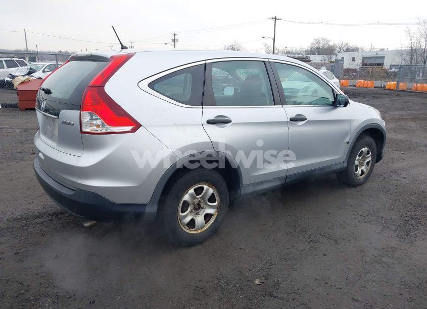 Photo 4 of 2014 Honda Cr-v LX (VIN 2HKRM4H30EH706817)