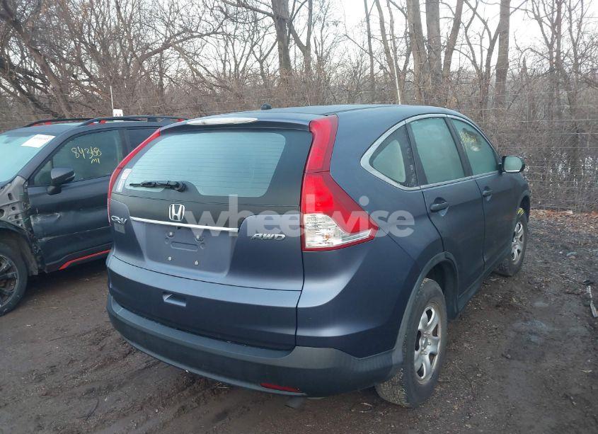 Photo 4 of 2014 Honda Cr-v LX (VIN 2HKRM4H30EH707160)