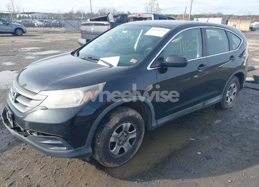 Photo 2 of 2014 Honda Cr-v LX (VIN 2HKRM4H30EH720345)