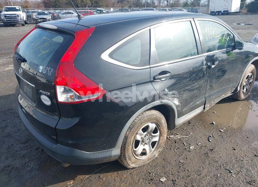Photo 4 of 2014 Honda Cr-v LX (VIN 2HKRM4H30EH720345)