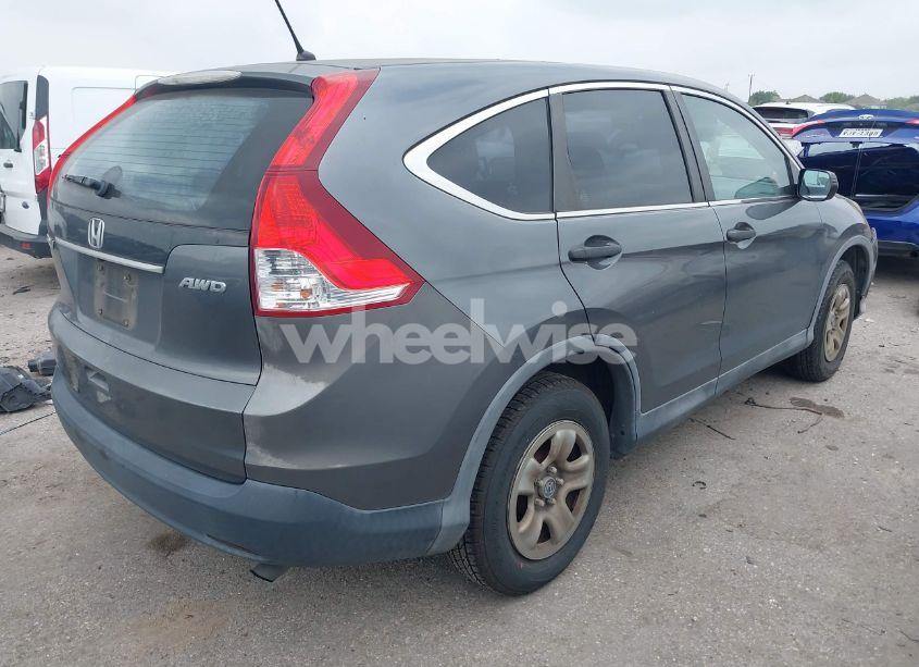 Photo 4 of 2013 Honda Cr-v LX (VIN 2HKRM4H31DH605204)