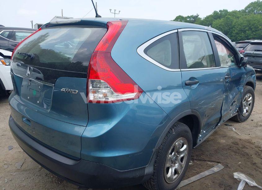 Photo 4 of 2013 Honda Cr-v LX (VIN 2HKRM4H31DH689931)