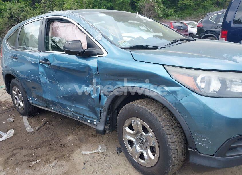 Photo 6 of 2013 Honda Cr-v LX (VIN 2HKRM4H31DH689931)