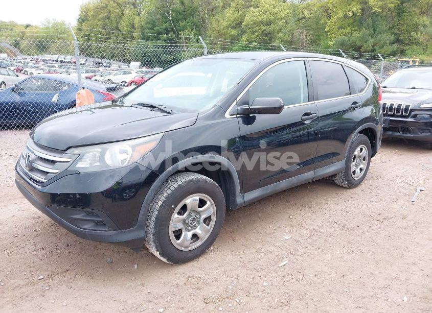 Photo 2 of 2013 Honda Cr-v LX (VIN 2HKRM4H31DH692876)