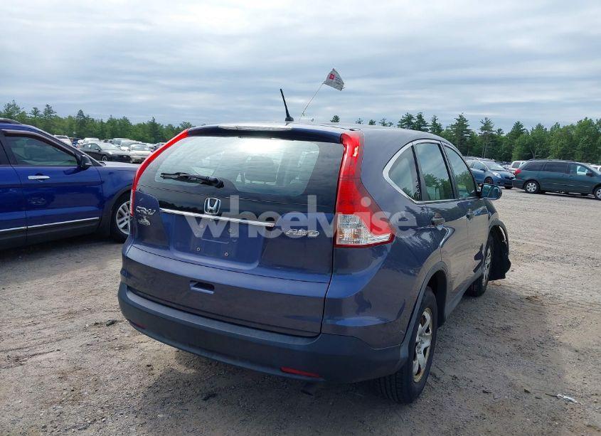 Photo 4 of 2014 Honda Cr-v LX (VIN 2HKRM4H31EH613630)