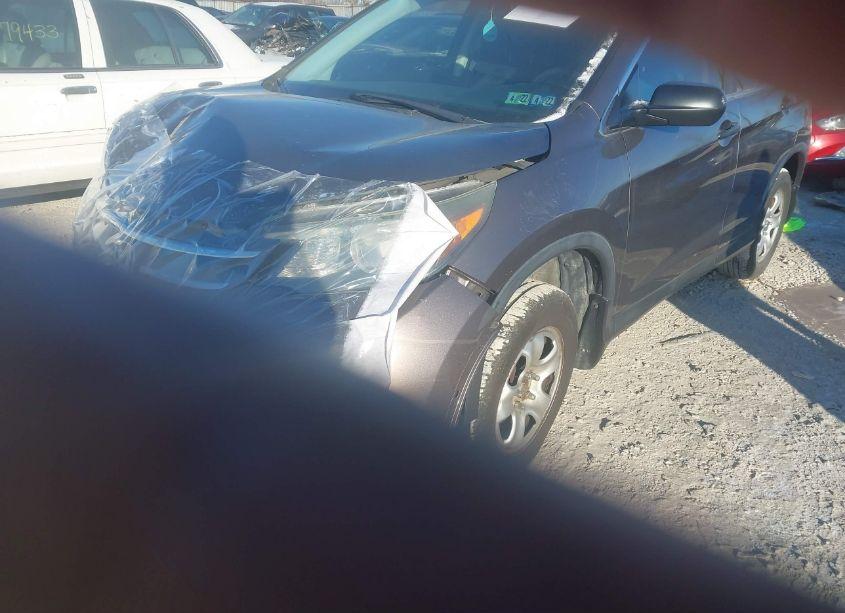 Photo 2 of 2014 Honda Cr-v LX (VIN 2HKRM4H31EH619332)