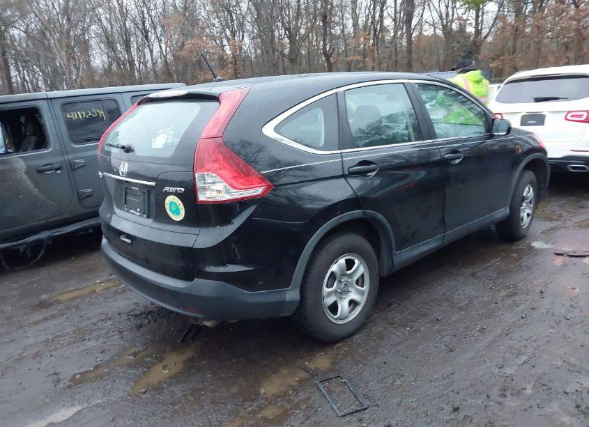 Photo 4 of 2014 Honda Cr-v LX (VIN 2HKRM4H31EH709239)