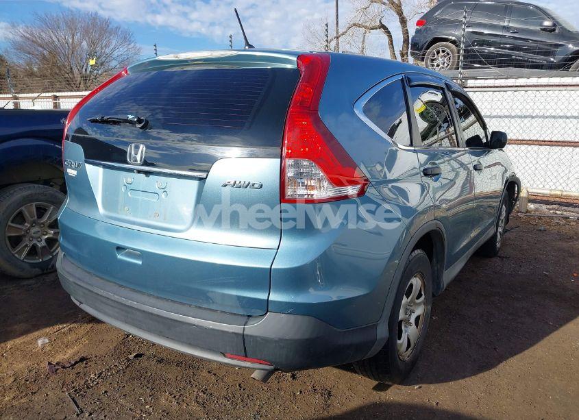 Photo 4 of 2014 Honda Cr-v LX (VIN 2HKRM4H32EH615533)