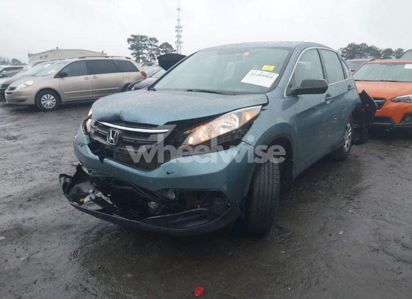 Photo 2 of 2014 Honda Cr-v LX (VIN 2HKRM4H32EH673271)