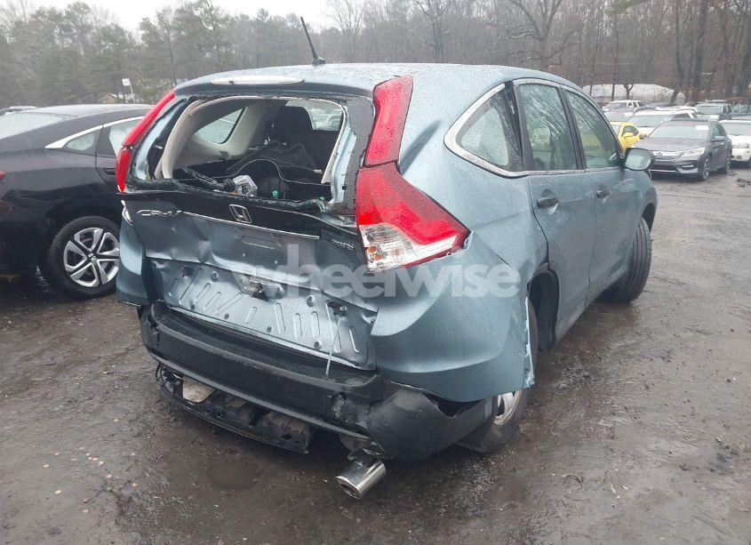 Photo 4 of 2014 Honda Cr-v LX (VIN 2HKRM4H32EH673271)