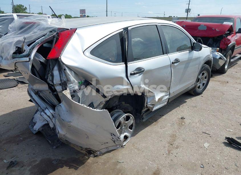 Photo 4 of 2015 Honda Cr-v LX (VIN 2HKRM4H32FH630230)