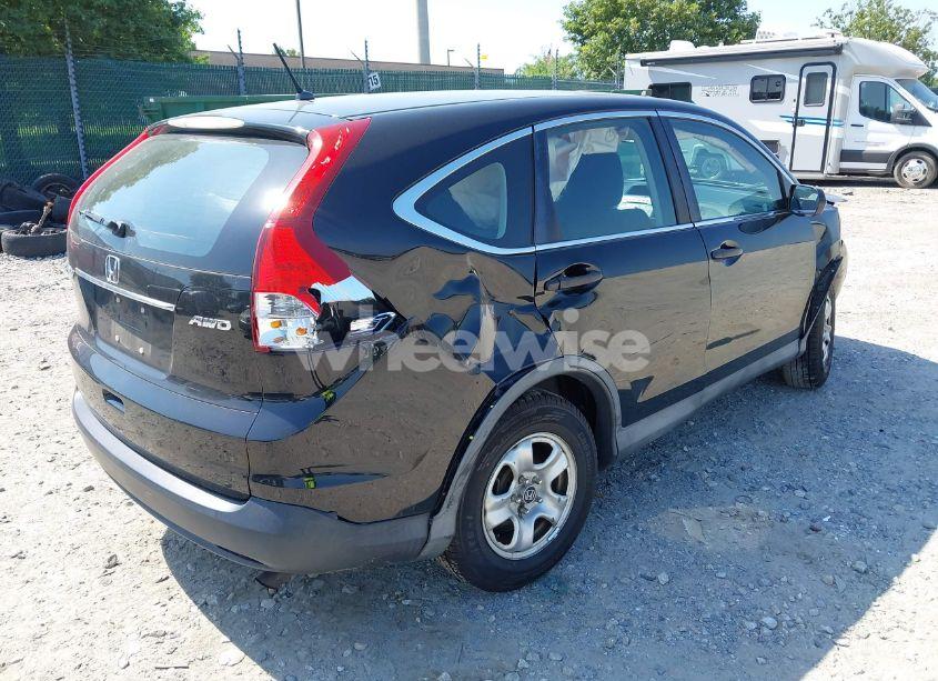 Photo 4 of 2013 Honda Cr-v LX (VIN 2HKRM4H33DH673875)