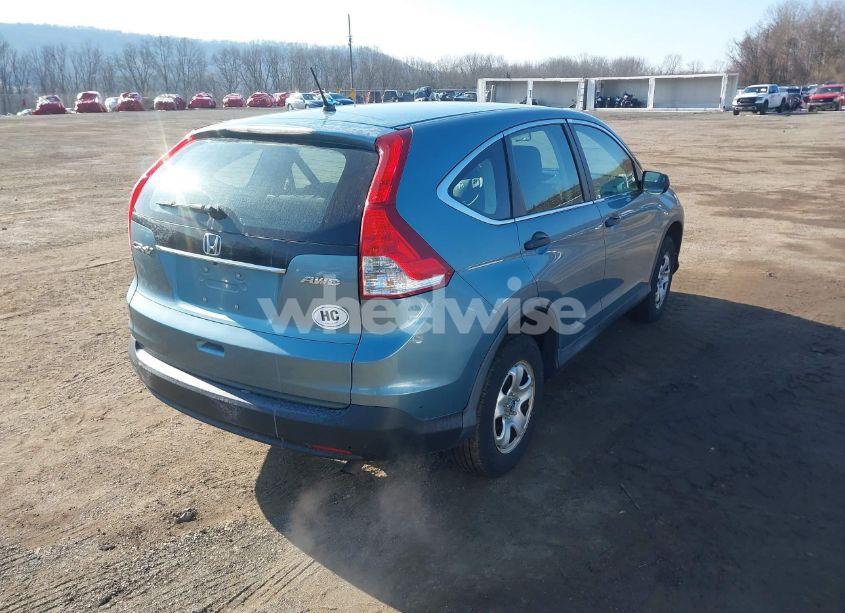 Photo 4 of 2014 Honda Cr-v LX (VIN 2HKRM4H33EH625259)