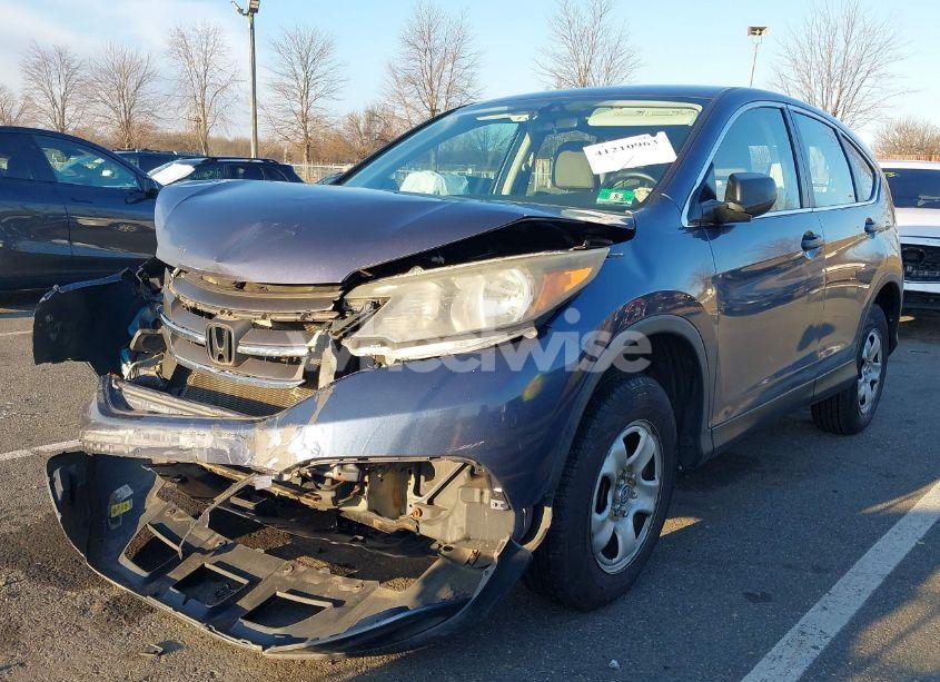 Photo 2 of 2014 Honda Cr-v LX (VIN 2HKRM4H33EH633054)