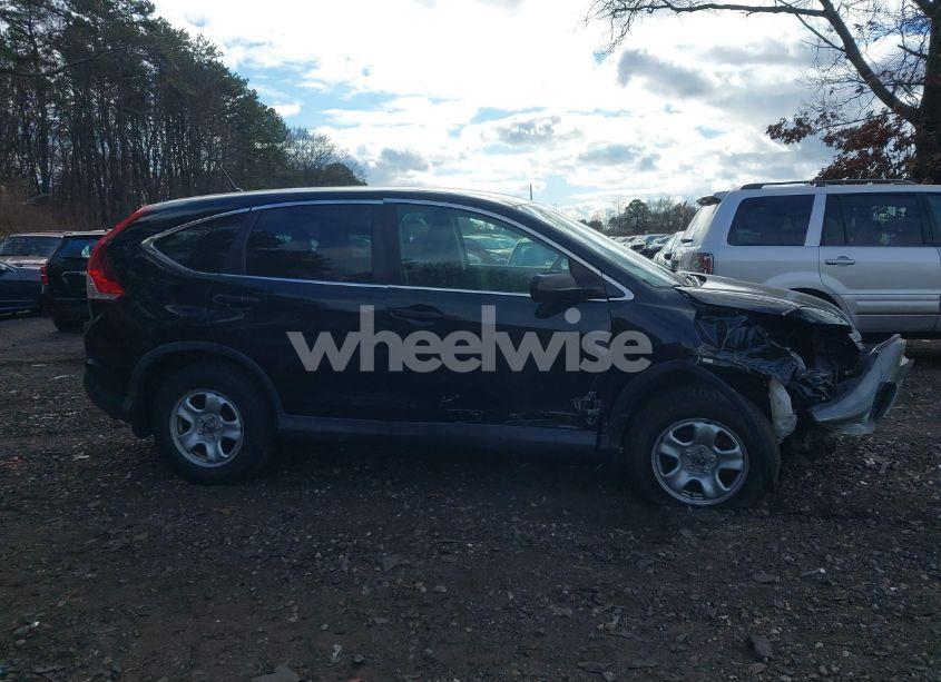 Photo 13 of 2014 Honda Cr-v LX (VIN 2HKRM4H33EH689852)