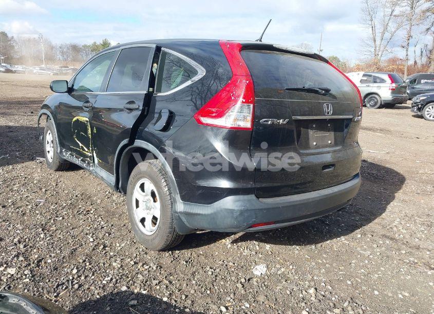 Photo 3 of 2014 Honda Cr-v LX (VIN 2HKRM4H33EH689852)