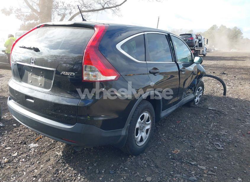 Photo 4 of 2014 Honda Cr-v LX (VIN 2HKRM4H33EH689852)