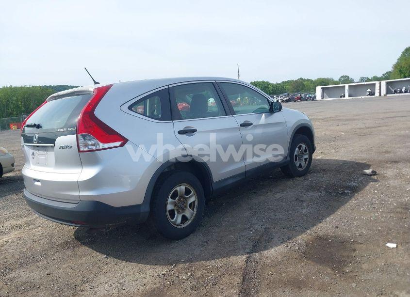 Photo 4 of 2013 Honda Cr-v LX (VIN 2HKRM4H34DH623311)