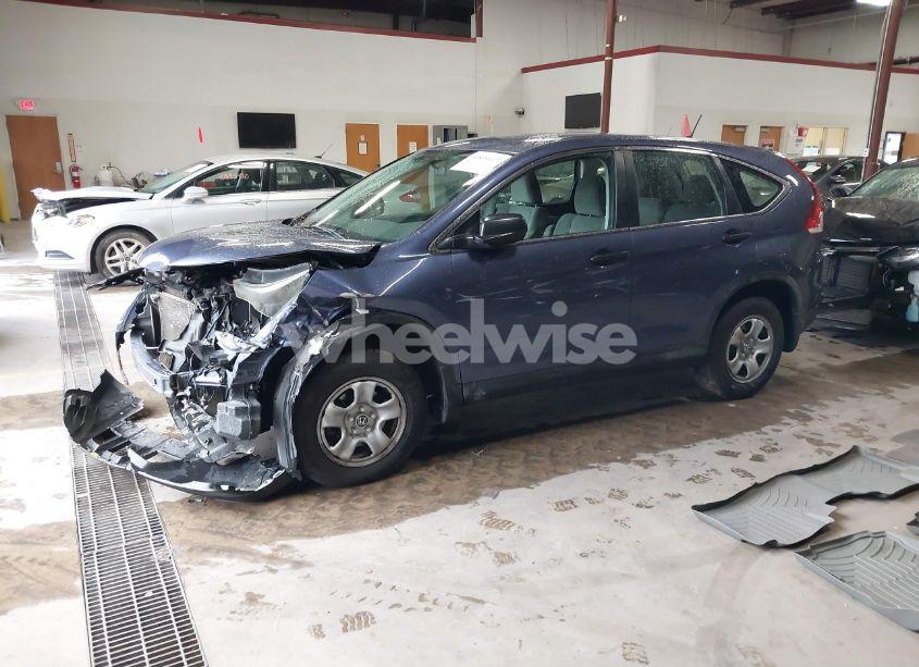 Photo 2 of 2014 Honda Cr-v LX (VIN 2HKRM4H34EH637520)