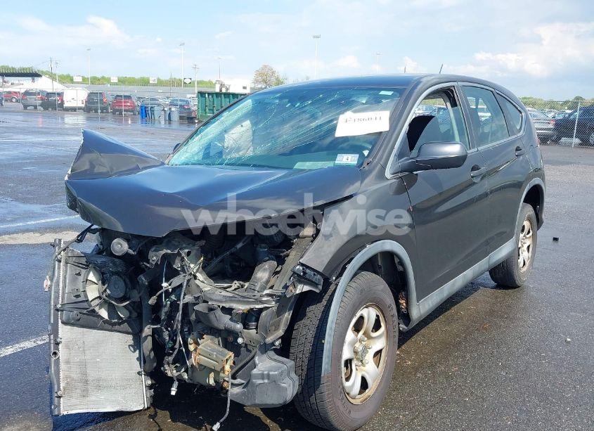 Photo 2 of 2014 Honda Cr-v LX (VIN 2HKRM4H34EH654611)