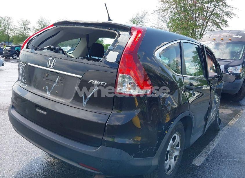 Photo 4 of 2014 Honda Cr-v LX (VIN 2HKRM4H34EH654611)