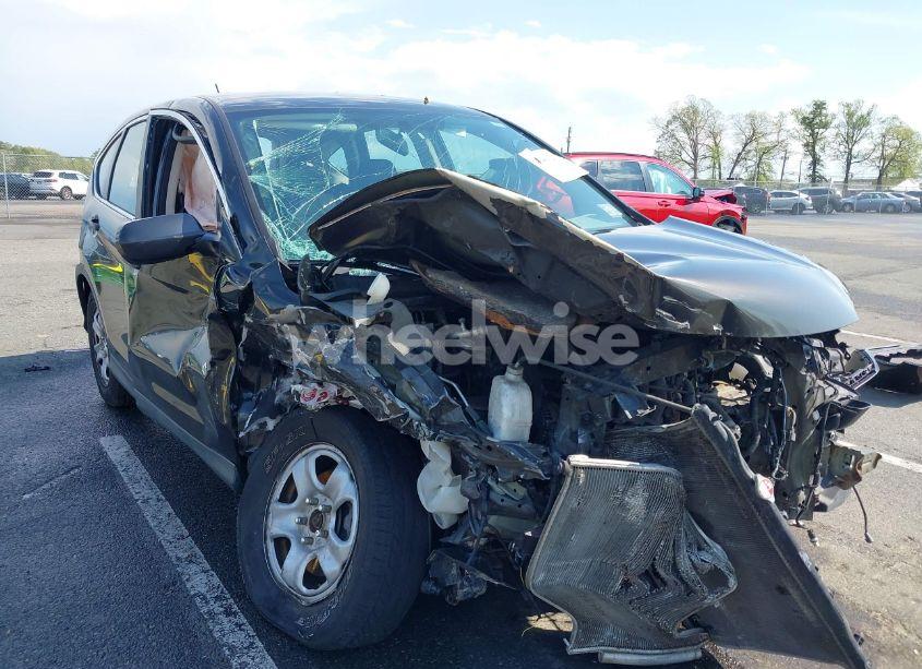 Photo 6 of 2014 Honda Cr-v LX (VIN 2HKRM4H34EH654611)