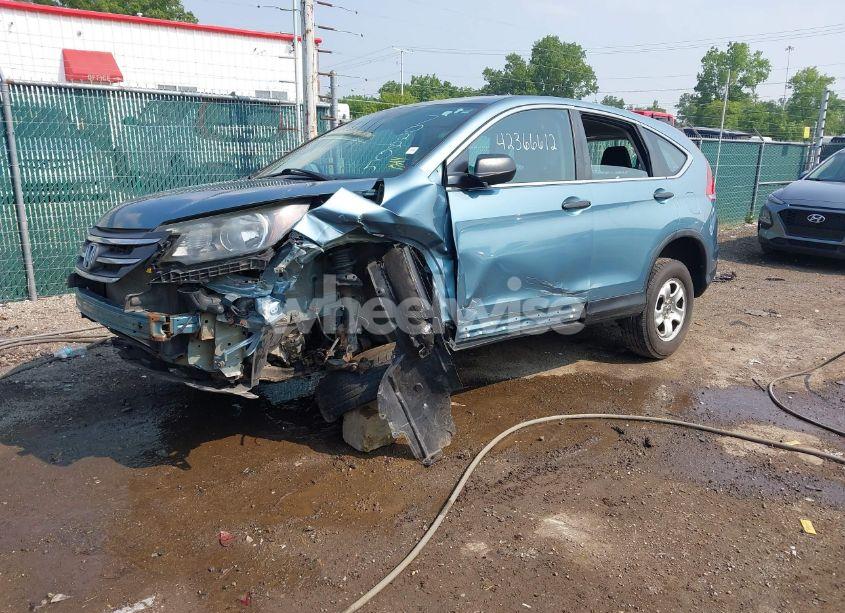 Photo 2 of 2014 Honda Cr-v LX (VIN 2HKRM4H34EH702205)