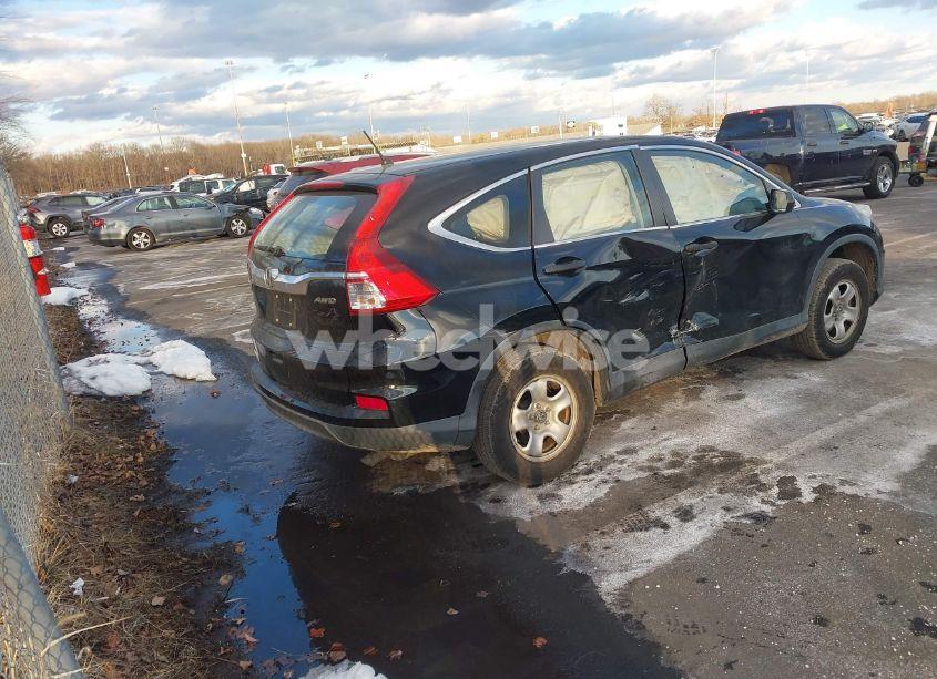 Photo 4 of 2015 Honda Cr-v LX (VIN 2HKRM4H34FH603000)