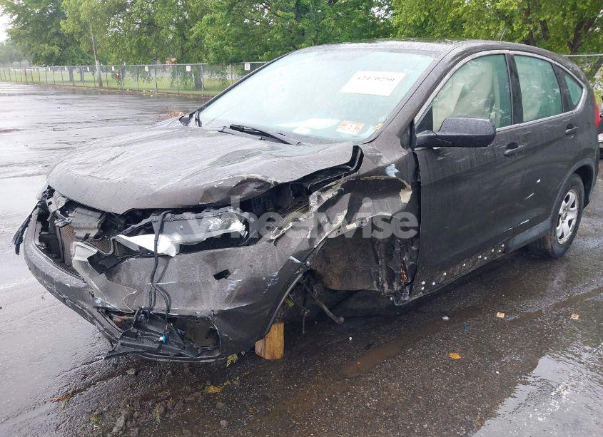 Photo 2 of 2015 Honda Cr-v LX (VIN 2HKRM4H34FH703940)