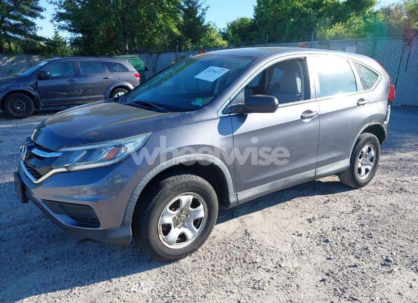 Photo 2 of 2016 Honda Cr-v LX (VIN 2HKRM4H34GH671427)