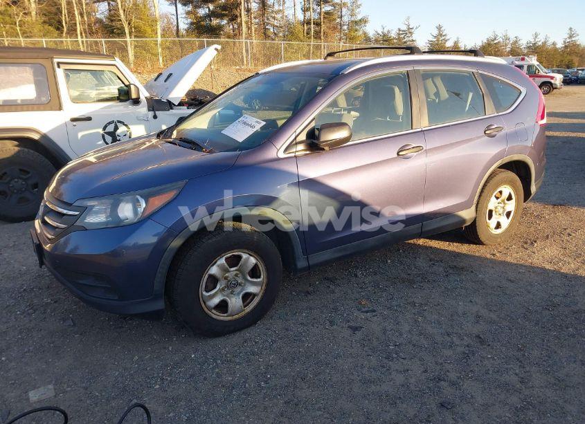 Photo 2 of 2014 Honda Cr-v LX (VIN 2HKRM4H35EH600878)