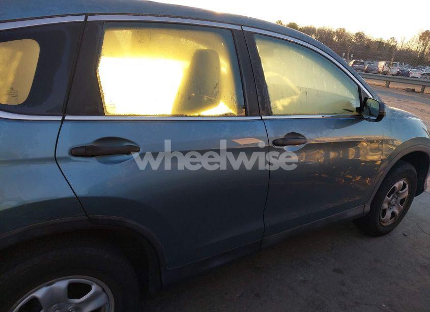 Photo 13 of 2014 Honda Cr-v LX (VIN 2HKRM4H35EH610715)