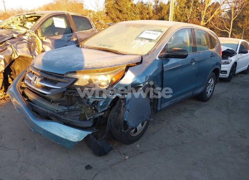 Photo 2 of 2014 Honda Cr-v LX (VIN 2HKRM4H35EH610715)