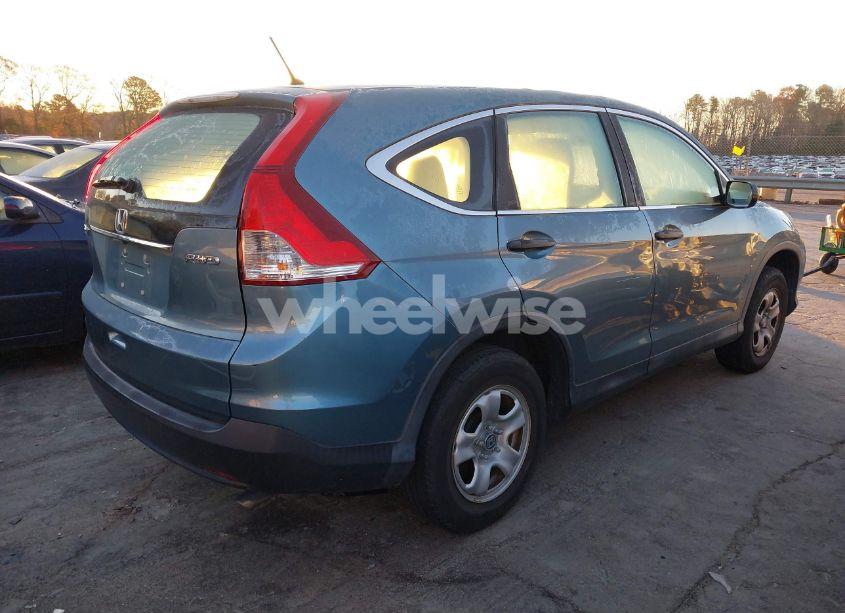 Photo 4 of 2014 Honda Cr-v LX (VIN 2HKRM4H35EH610715)