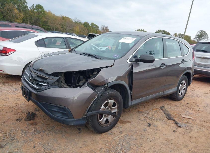 Photo 2 of 2014 Honda Cr-v LX (VIN 2HKRM4H35EH643973)
