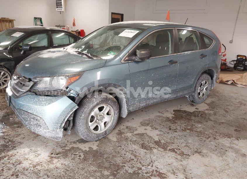 Photo 2 of 2014 Honda Cr-v LX (VIN 2HKRM4H35EH673295)